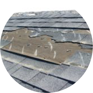 Roof shingles damaged by weather